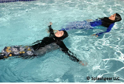 women swimming in a pool wearing Splashgear swimwear