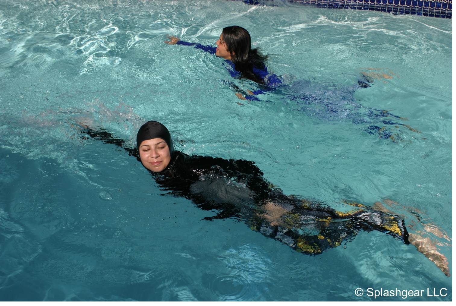 women swimming in a pool