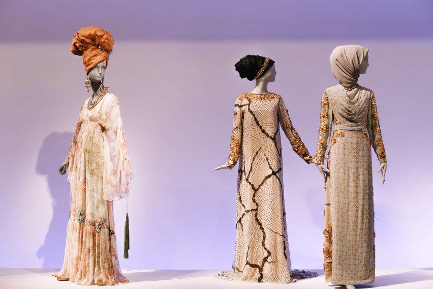long gowns with hair coverings at the Contemporary Muslim Fashions exhibit